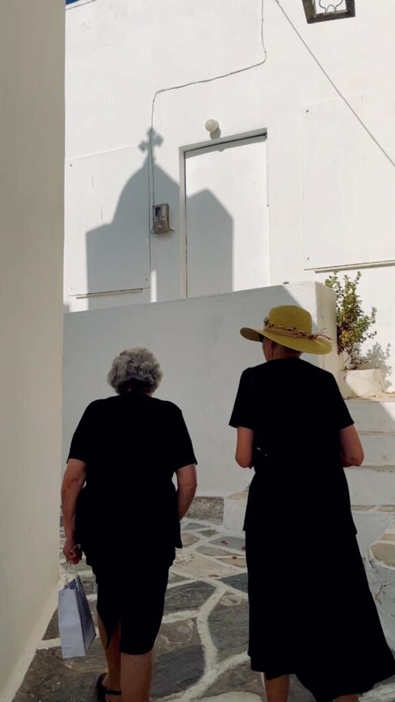 Two women walking home from Sunday services