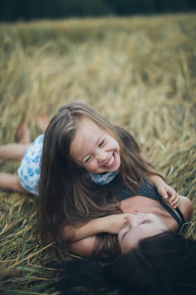 mother and daughter laughing