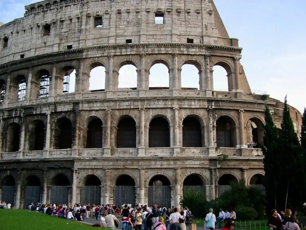 Original photo by paul partridge of the colosseum in rome with crowds—an iconic stop for the best multi-generation vacations in italy.