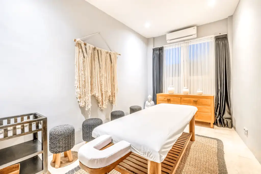 A villa's private spa area with massage table.