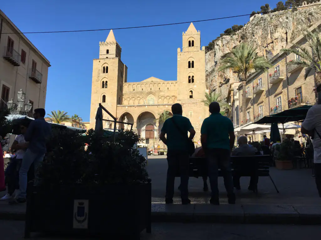 Relaxing in Piazza Duomo in Cefalù, Sicily, with views of the Arab-Norman Cathedral.