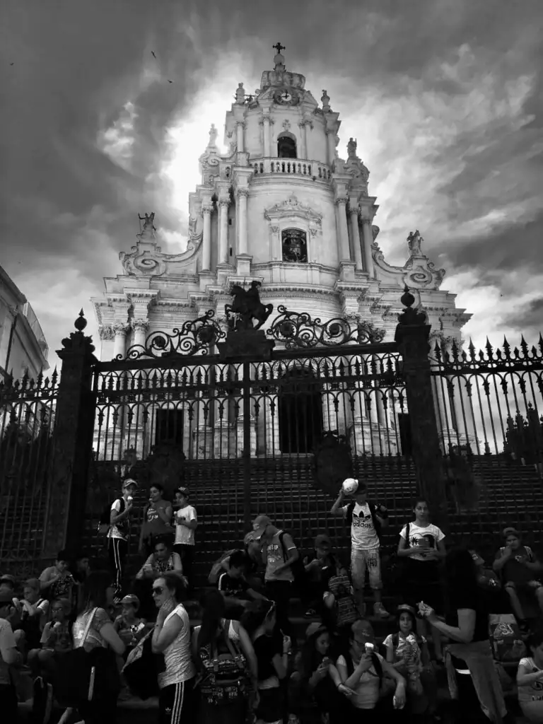 Crowds gathered outside the Duomo di San Giorgio in Ragusa Ibla, a standout of Sicilian Baroque architecture.